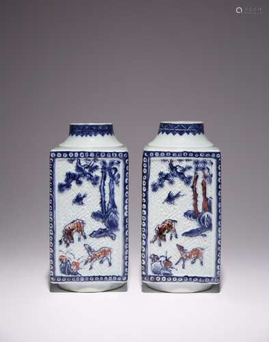 A PAIR OF CHINESE UNDERGLAZE BLUE AND COPPER-RED CONG VASES ...