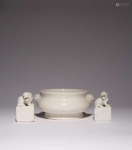 A CHINESE BLANC DE CHINE INCENSE BURNER AND TWO SQUARE SEALS...