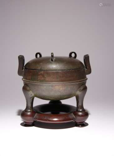 A CHINESE BRONZE TRIPOD INCENSE BURNER AND COVER POSSIBLY HA...