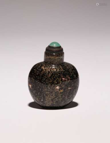 A CHINESE GLASS OVOID SNUFF BOTTLE 18TH CENTURY With a black...