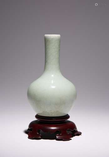 A SMALL CHINESE CRACKLE GLAZED CELADON BOTTLE VASE 18TH CENT...