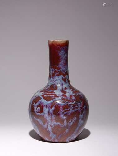 A CHINESE FLAMBE GLAZED BOTTLE VASE, TIANQIUPING 18TH/19TH C...