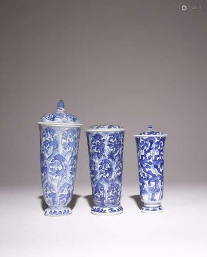 THREE CHINESE BLUE AND WHITE TALL BEAKER VASES KANGXI 1662-1...