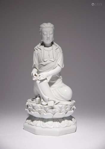 A CHINESE BLANC DE CHINE FIGURE OF GUANYIN 19TH/20TH CENTURY...