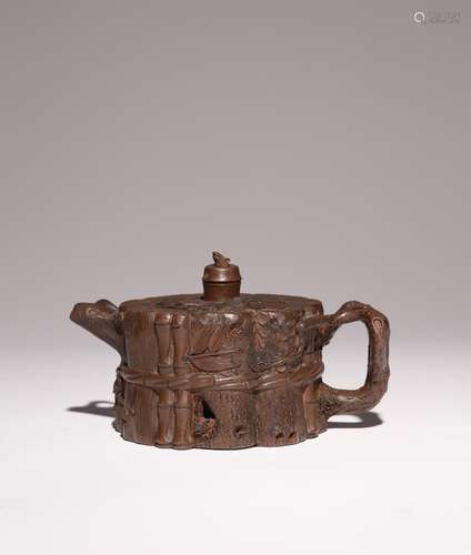 A CHINESE YIXING THREE FRIENDS OF WINTER TEAPOT AND COVER QI...