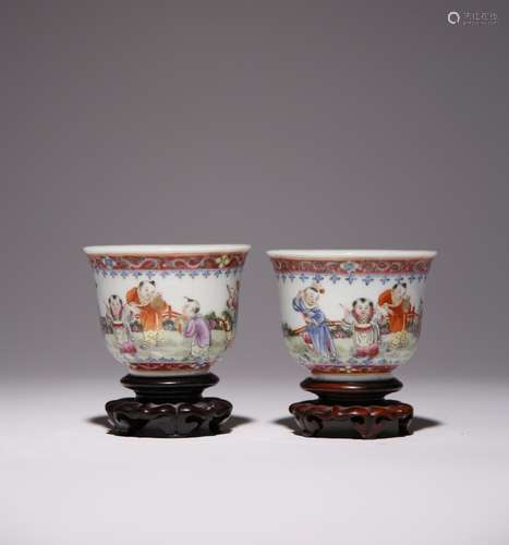 A PAIR OF CHINESE FAMILLE ROSE BOYS CUPS REPUBLIC PERIOD Eac...