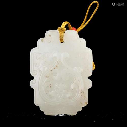 A WHITE JADE 'CHILONG' PENDANT