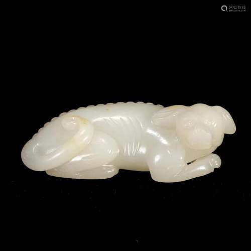 A WHITE JADE BEAST CARVING