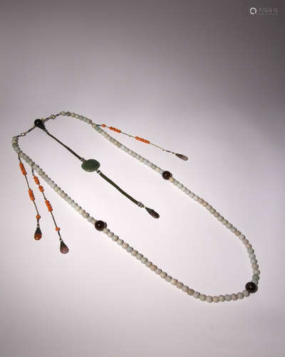 A CHINESE JADE, CORAL AND HARDSTONE CEREMONIAL COURT NECKLAC...