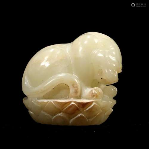 A WHITE JADE 'BEAST' CARVING