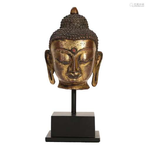 A GILT-BRONZE BUDDHA HEAD