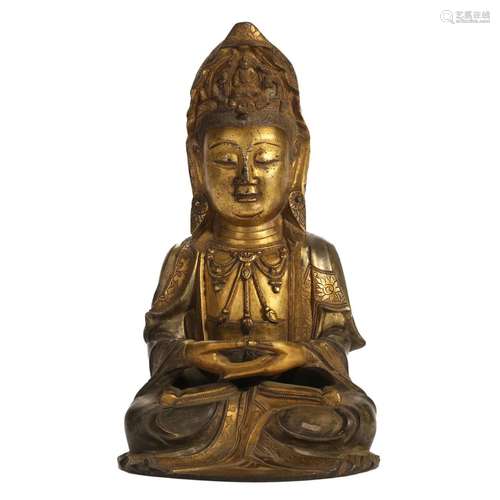 A GILT-BRONZE FIGURE OF SEATED GUANYIN