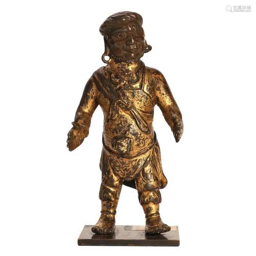 A GILT-BRONZE FIGURE OF A GUARDIAN