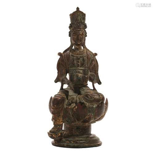 A BRONZE FIGURE OF A SEATED LAMA