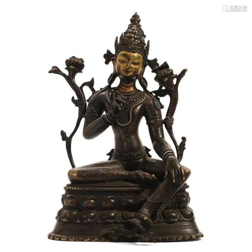 A BRONZE FIGURE OF A SEATED TARA