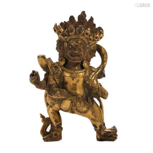 A GILT-BRONZE FIGURE OF A GUARDIAN