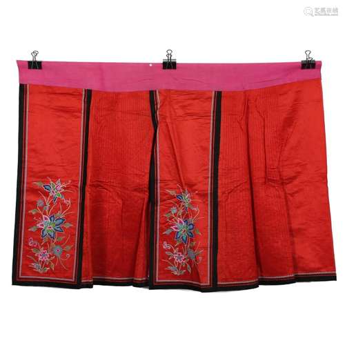 A RED-GROUND EMBROIDERED LADY'S SKIRT