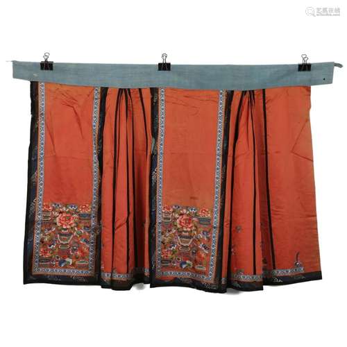 AN ORANGE-GROUND EMBROIDERED LADY'S SKIRT