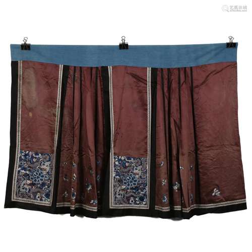 A BROWN-GROUND EMBROIDERED LADY'S SKIRT