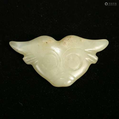 A WHITE JADE 'BEAST' PENDANT