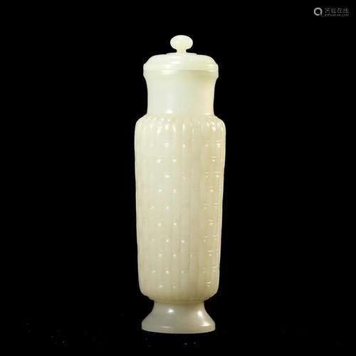 A WHITE JADE VASE