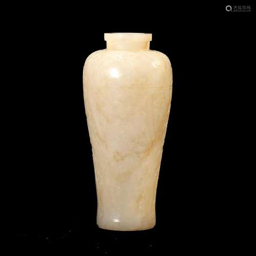 A WHITE JADE VASE