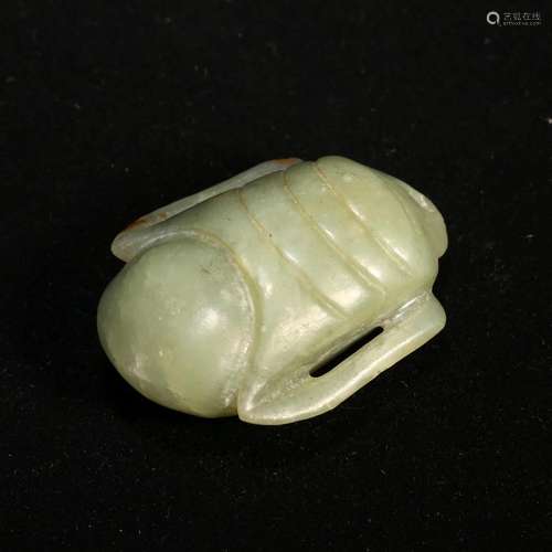 A WHITE JADE 'BEAST' PENDANT