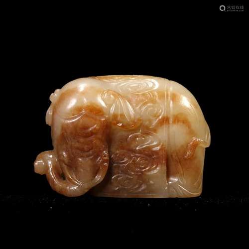 A RUSSET JADE 'ELEPHANT' CARVING