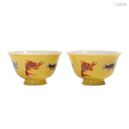 A PAIR OF YELLOW-GLAZED 'FISH' BOWLS