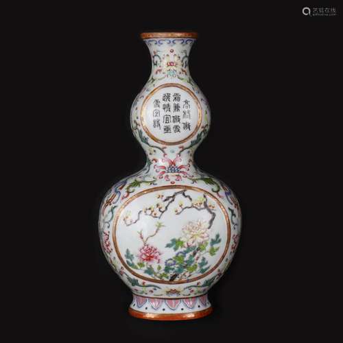 A CHINESE GOURD-SHAPED FAMILLE ROSE PORCELAIN WALL VASE