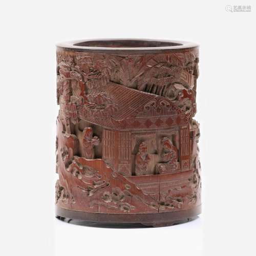 A CARVED BAMBOO BRUSH POT WITH ZITAN MOUTH AND BOTTOM.