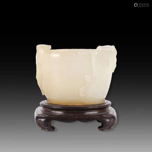 A CHINESE WHITE JADE CUP WITH WOOD STAND.