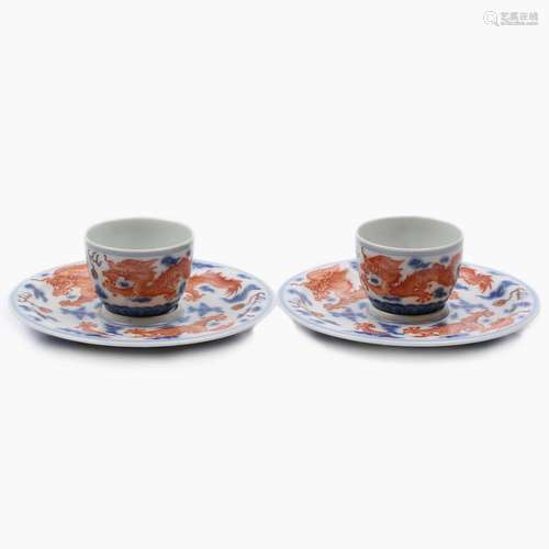 A PAIR OF CHINESE IRON-RED AND BLUE AND WHITE GLAZED