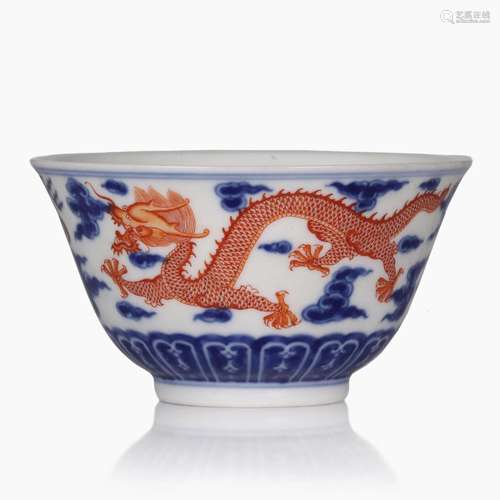 A CHINESE IRON-RED AND BLUE AND WHITE DRAGON PATTERN