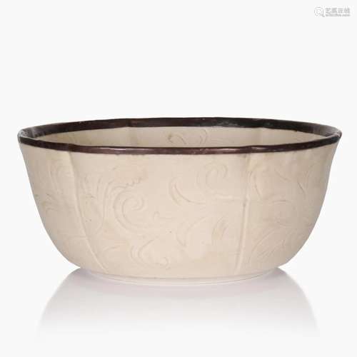 A CHINESE DINGYAO SIX-LOBED CERAMIC DEEP BOWL.