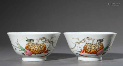 A pair of pastel melon and fruit poetry bowls