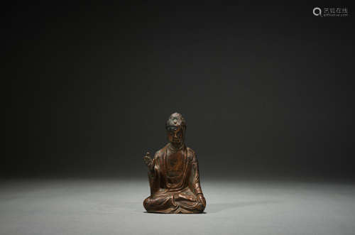 Copper made small sitting Buddha