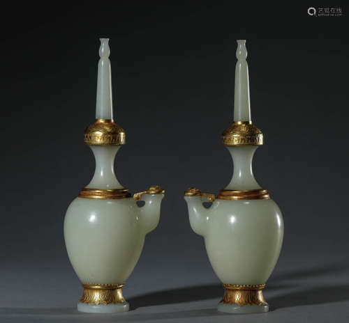 A pair of Hetian jade-wrapped gold clean bottles