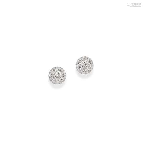 A 18K white gold and diamond earrings