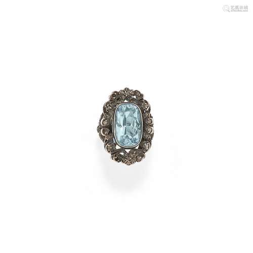 A silver, aquamarine and diamond ring