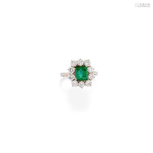 A 18K white gold, emerald and diamond ring