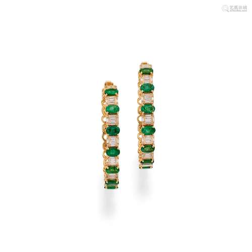 A 18K yellow gold, emerald and diamond earclips