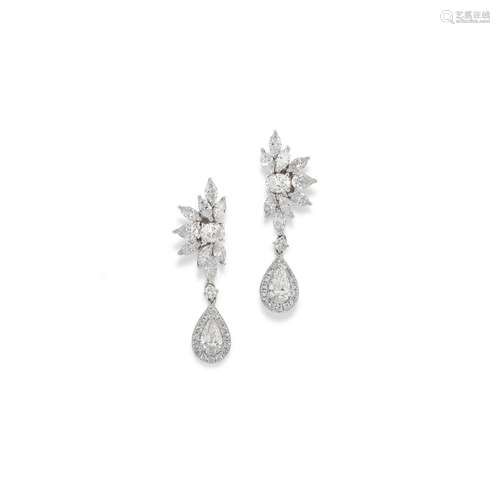 A 18K white gold and diamond earrings