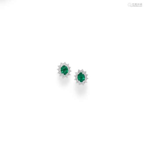 A 18K white gold, emerald and diamond earrings