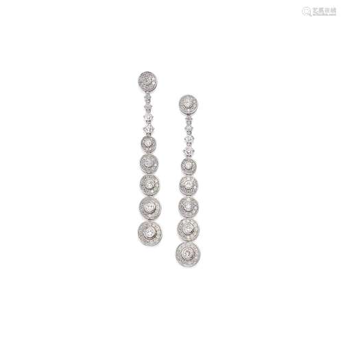 A 18K white gold and diamond earrings