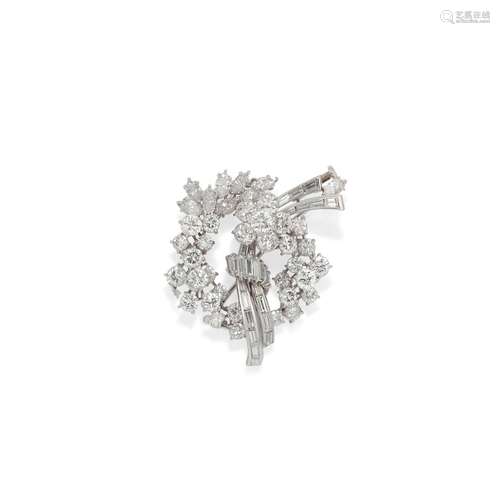 A platinum and diamond floral brooch