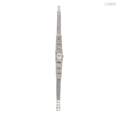 A 18K white gold and diamond lady's wristwatch, circa 1...