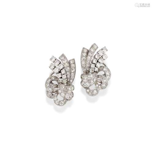 A 18K white gold, platinum and diamond earrings. circa 1950