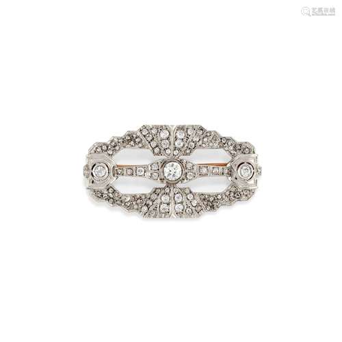 A 18K two color gold and diamond brooch