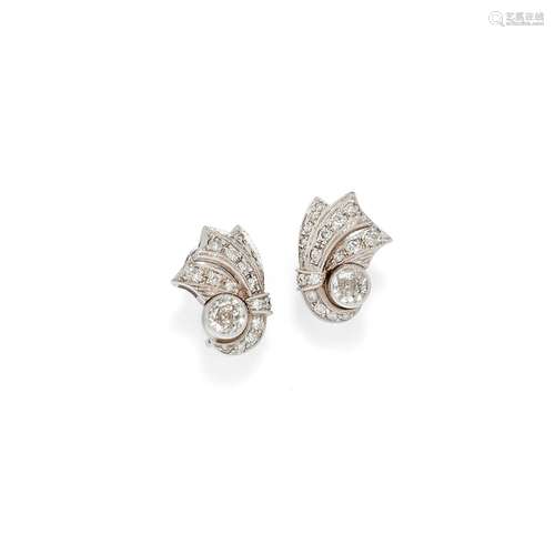 A 18K white gold and diamond earrings